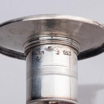 A pair of Swedish silver candlesticks, marks of Gustaf Folcker, Stockholm 1825.