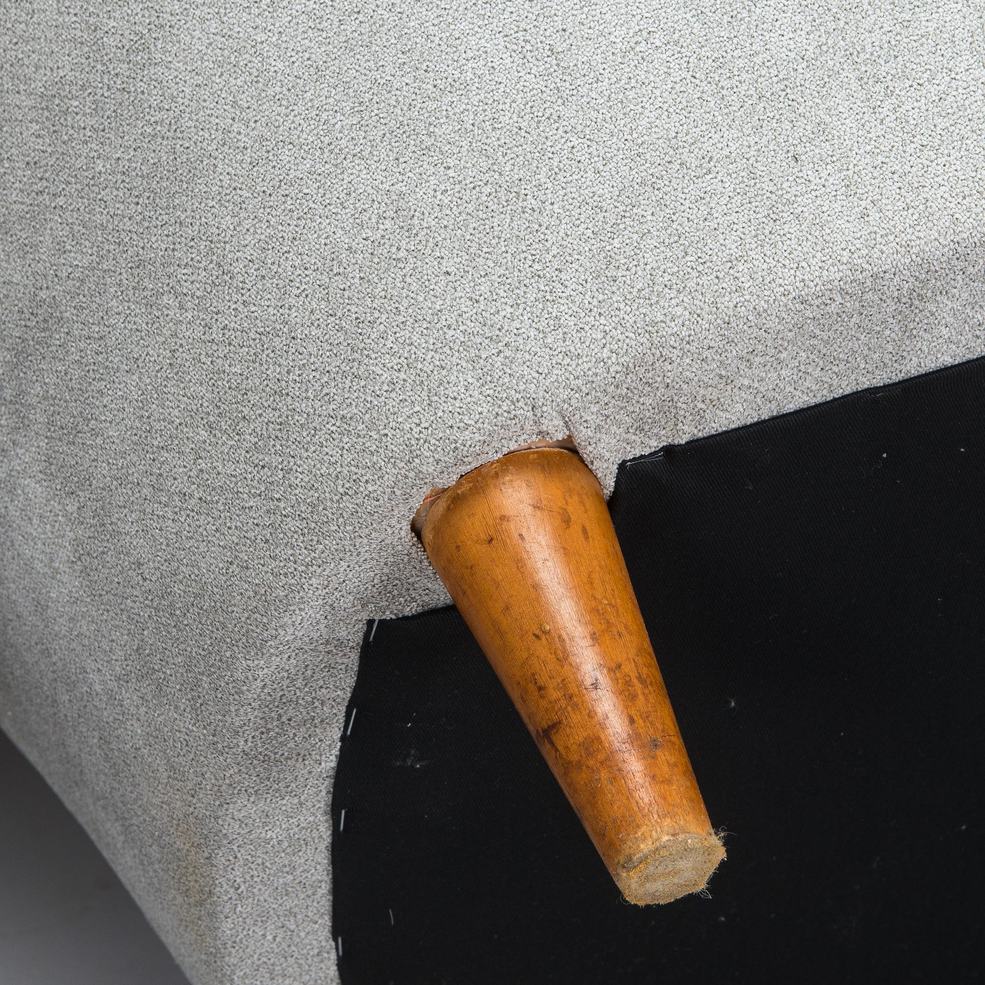 A pair of mid 20th century armchairs.