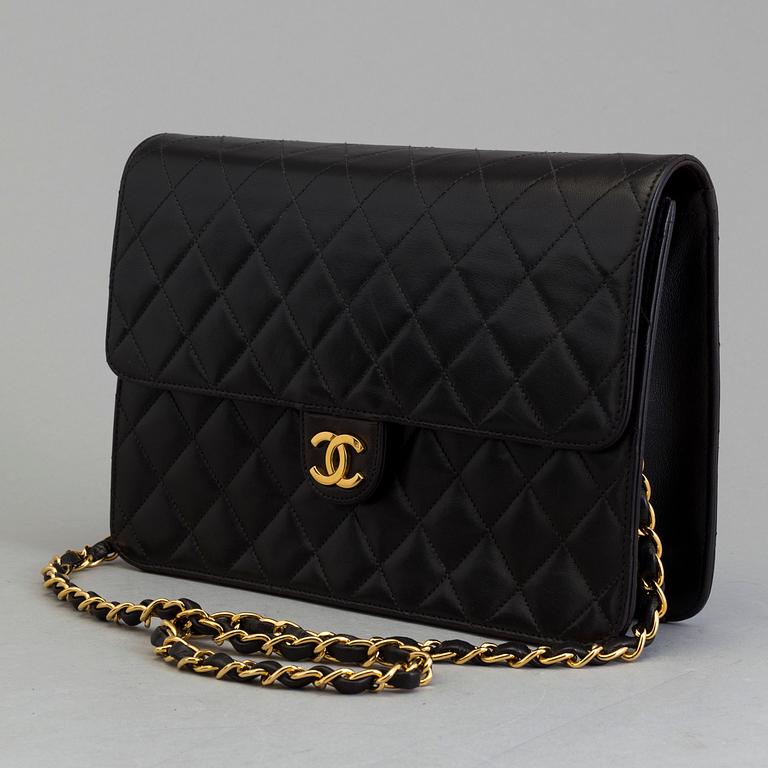 A black lambskin handbag by Chanel 1997-99.