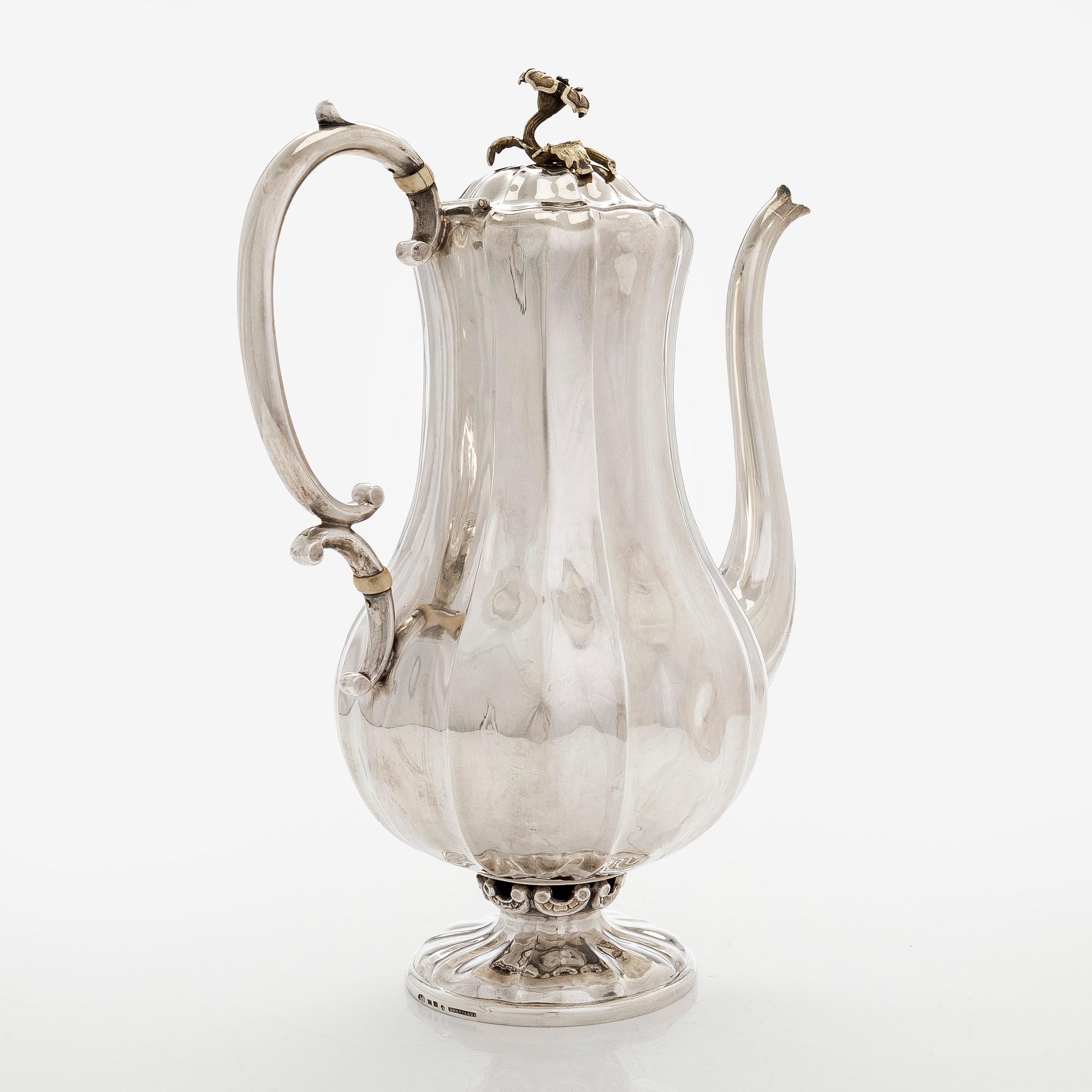 A parcel-gilt coffee pot, maker's mark of Johan Gustaf Ettinger, Vyborg 1861.