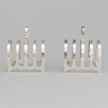 A pair of silver toast racks by Robert F. Mosley, Sheffield, England 1944.