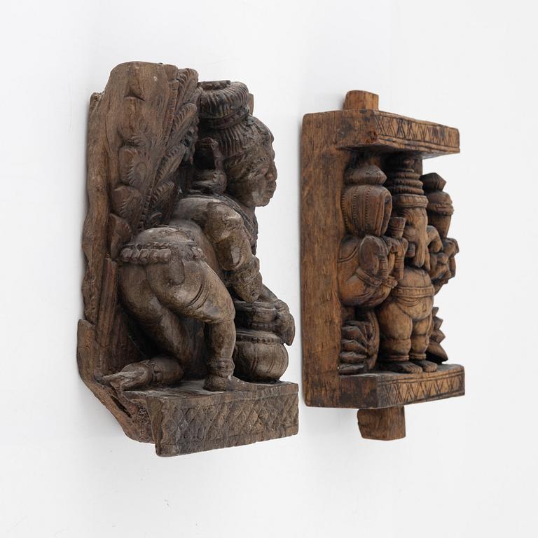 Two Indian carved wooden reliefs, around 1900.