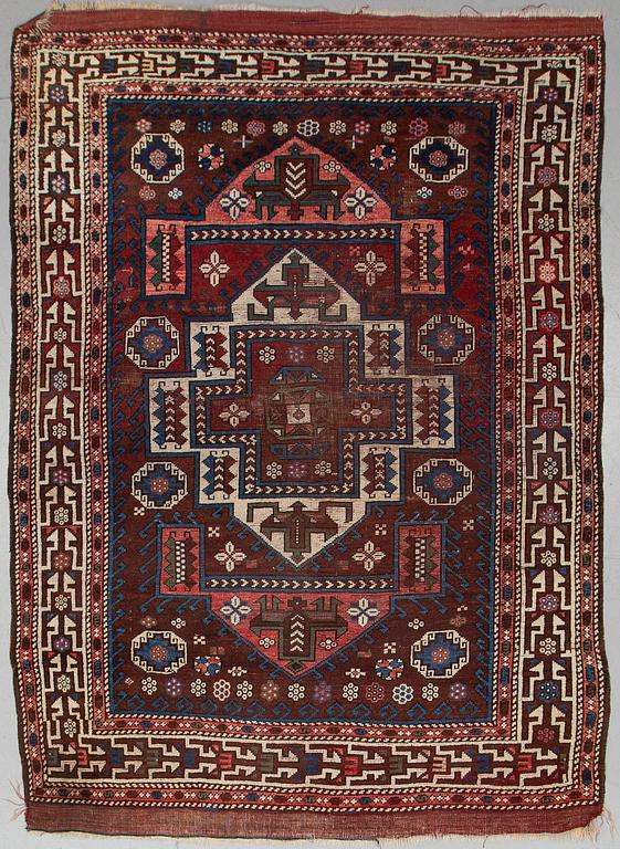 AN ANTIQUE TURKISH RUG, probably Bergama, ca 256 x 183 cm.
