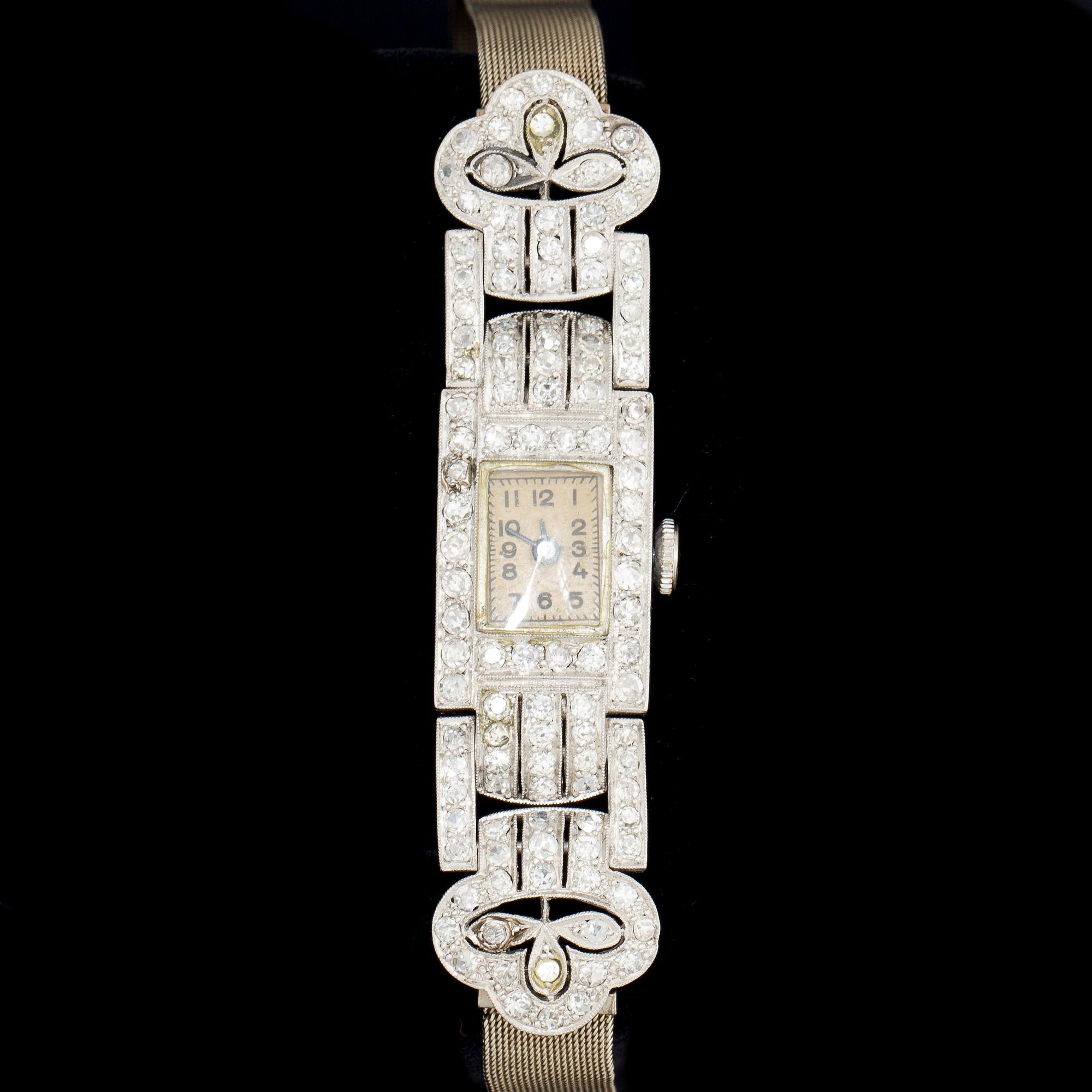 DAMARMBANDSUR, art deco, diamanter ca 1ct, vitguld. 1900-talets första hälft. Vikt ca 30g.
