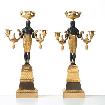 A pair of Empire three-light candelabra, circa 1810.