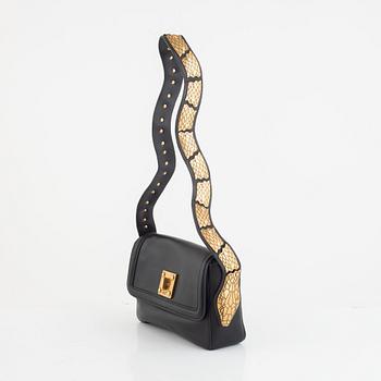 Valentino Red, A black leather snake bag.
