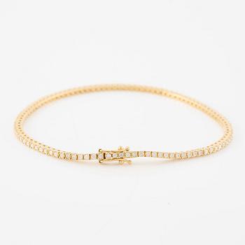 Tennis bracelet, 18K gold with brilliant-cut diamonds.
