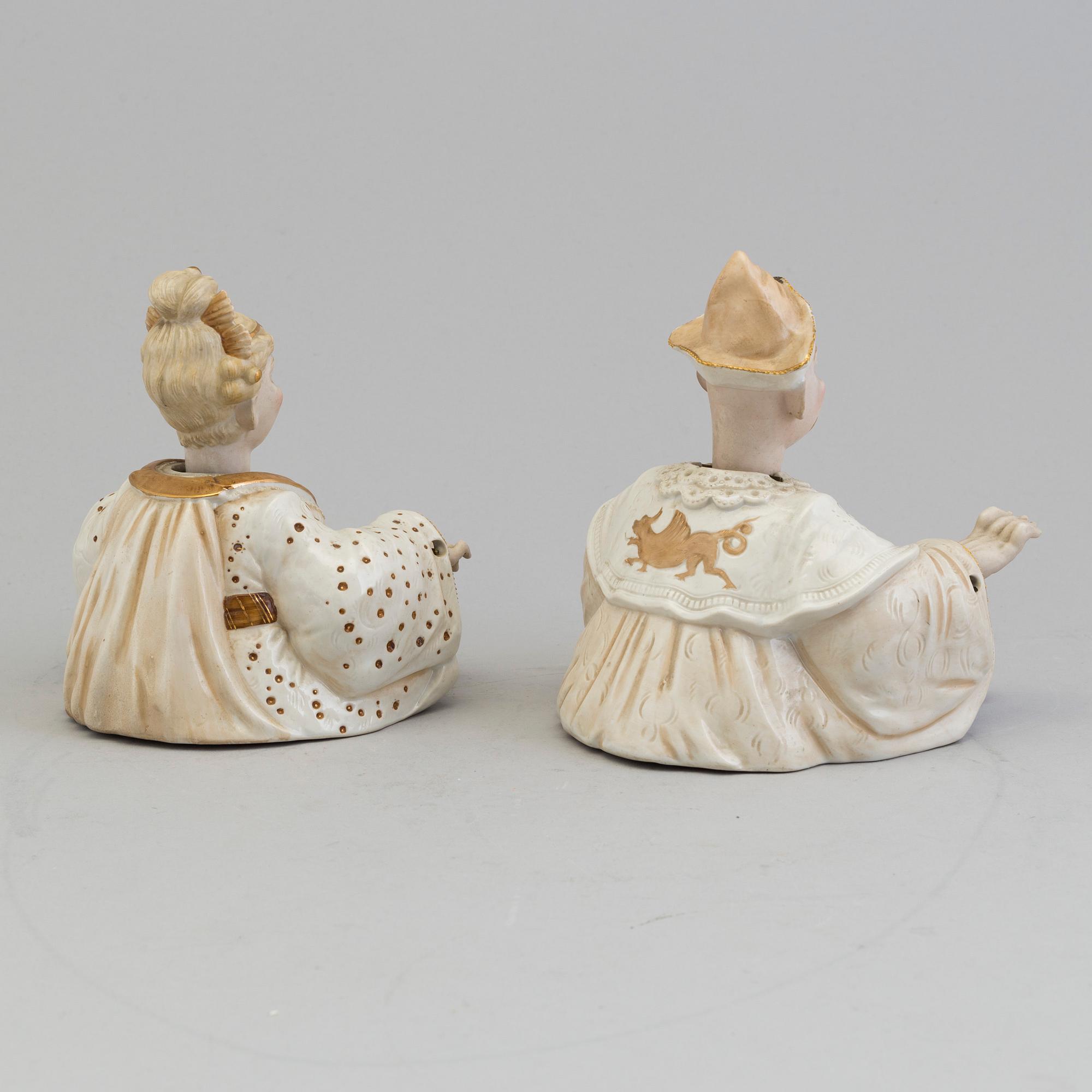 A pair of Chinese style 20th century porcelain nodding figures.