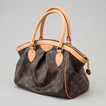 a LOUIS VUITTON 'Tivoli PM' bag.