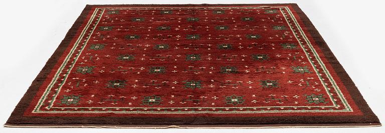 Nea Hållfast, attributed, a carpet, knotted pile, c 350 x 272 cm, signed KH.