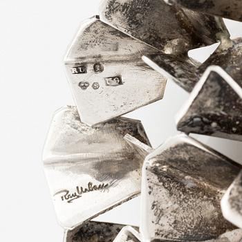 Rey Urban, brosch samt ring, silver med bergkristall.