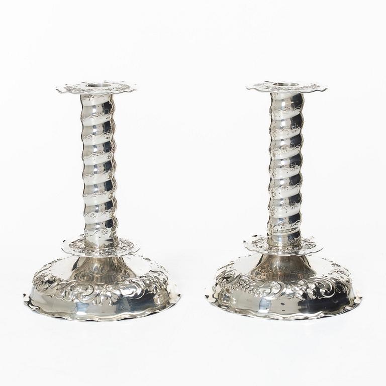 A pair of Swedish silver candelsticks, Baroque style, Silver, Tenn & Silver Ab, Gothenburg 1948.