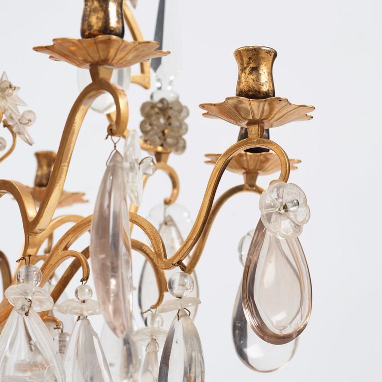 A Louis XV-style rock crystal eight-light chandelier, 20th century.