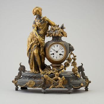 An end of the 20th century metal case mantle clock.