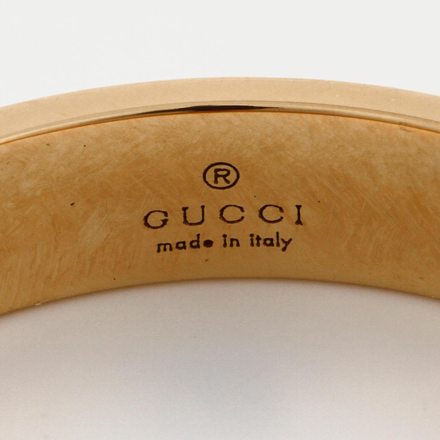 GUCCI, a "Gucci Icon" ring.