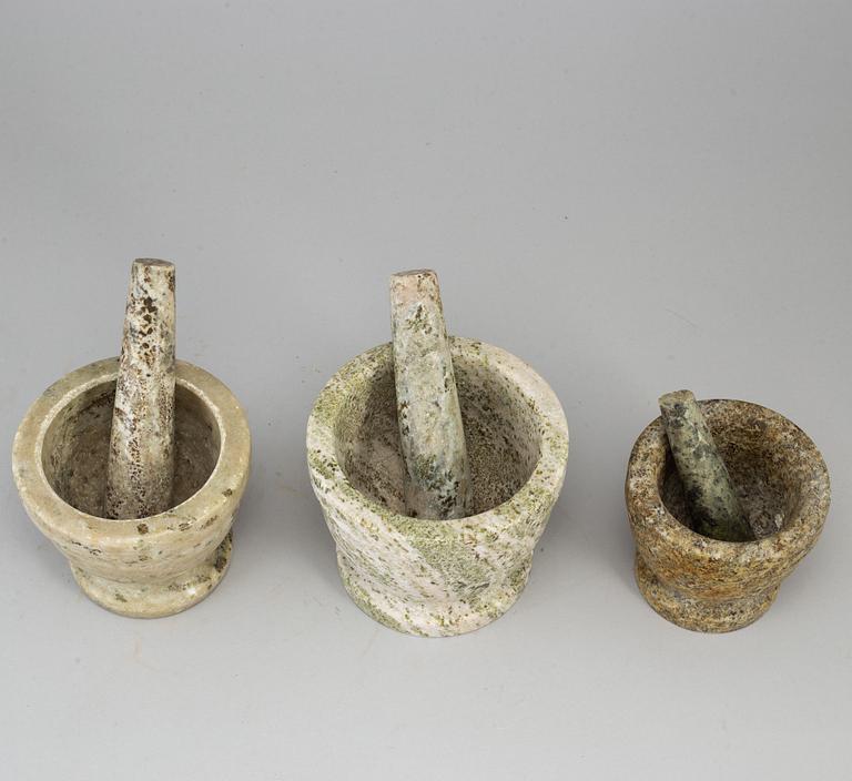 Three swedish green marble mortars and pestles.