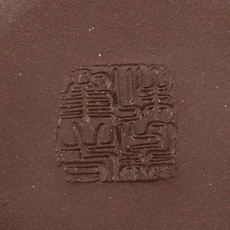 A group of three yixing pots, 20th century.