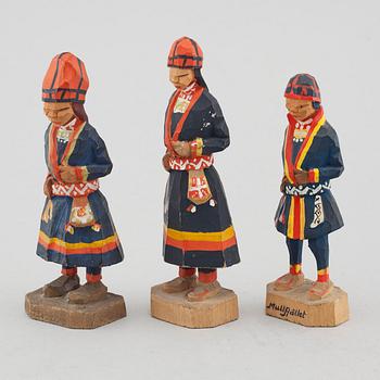 Three wooden figures by Georg Jonsson, signed GJ.