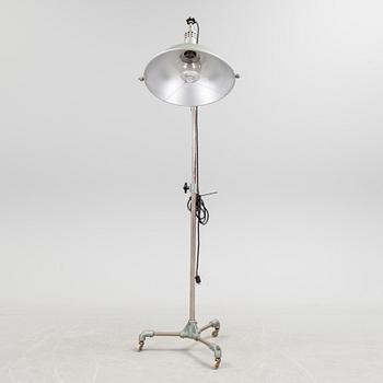 A German metal floor light from the mid 20th century.