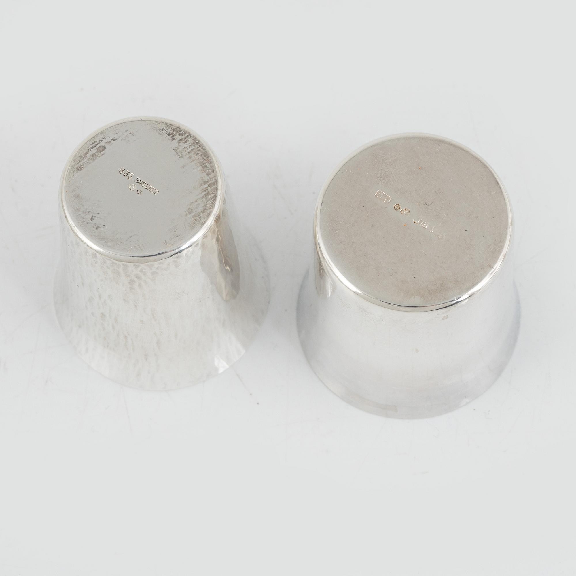 A set of 16 silver cups, including GAB, Stockholm 1964.