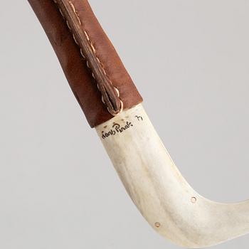 Lars Pirak, a reindeer horn knife, signed.