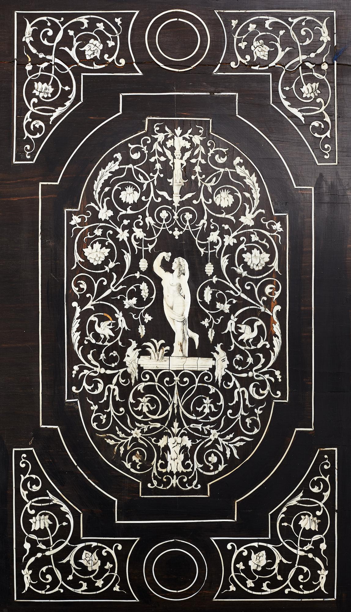 A Renaissance-style ebony, ebonized and ivory-inlaid library table, late 19th century, presumably Germany.