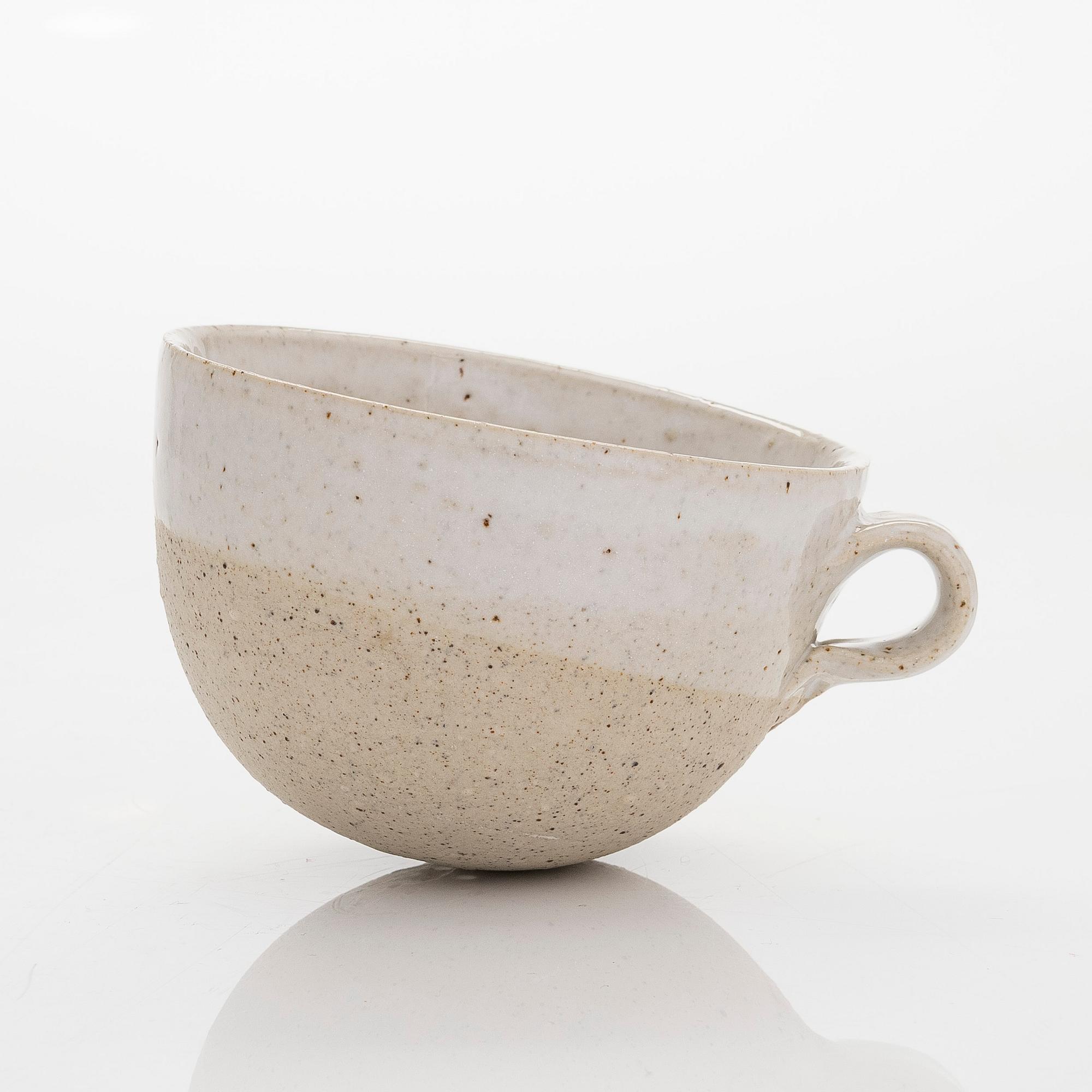 Kyllikki Salmenhaara, a stoneware tea strainer signed KS.