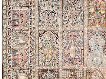 A silk Kashmir carpet, c 316 x 213 cm.