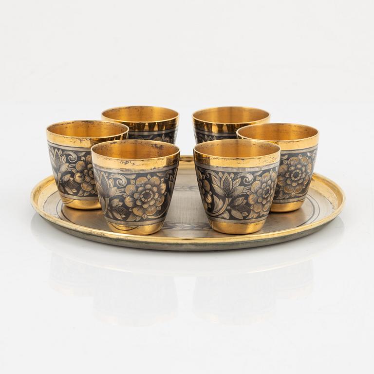 6 Russian 20th century silver beakers with niello, a small tray and two miniature enamel dishes.