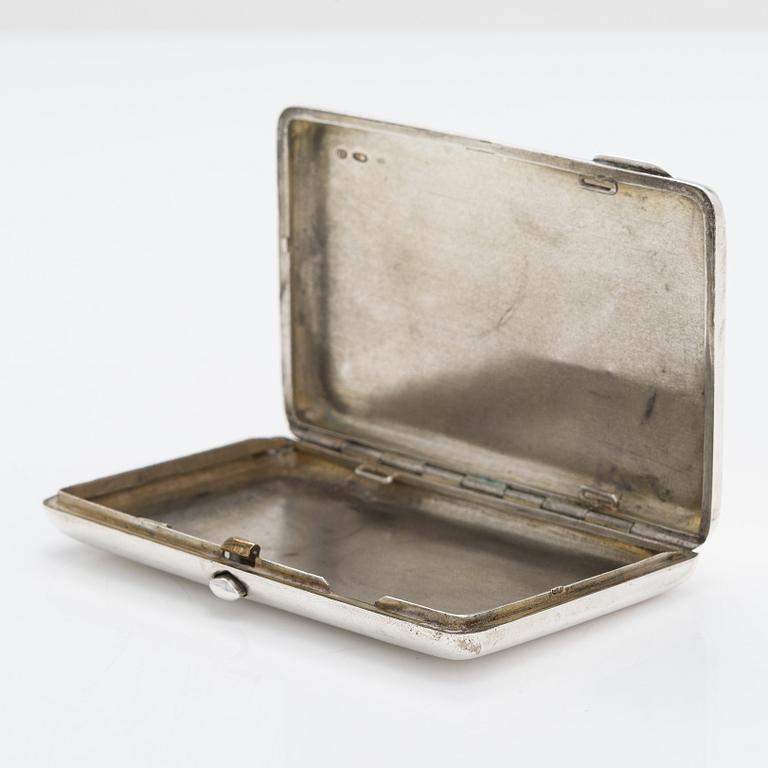 A silver cigarette case, maker's mark of Vasili Sikazev, Moscow 1908-17.