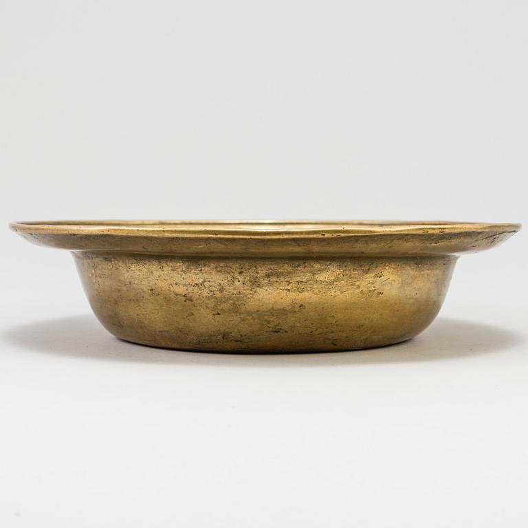 A 17th century bronze bowl.