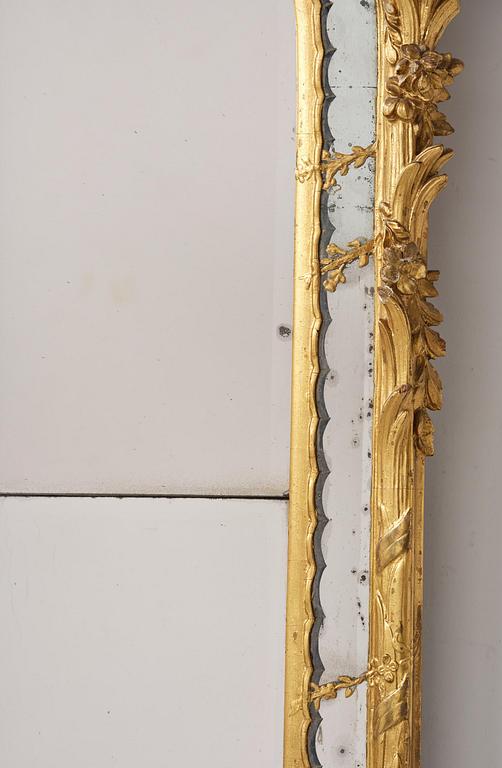 A giltwood rococo mirror, Stockholm, later part 18th century.