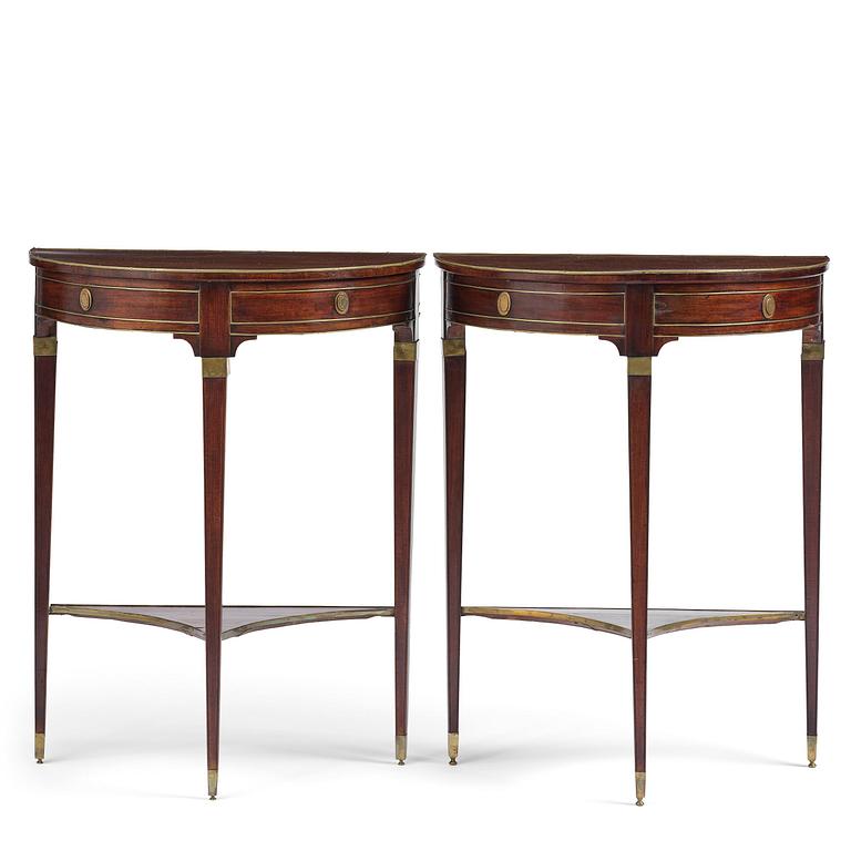 A pair of late Gustavian mahogany consoles in the manner of A. Lundelius, Stochkolm, late 18th century.