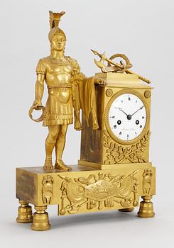 A French Empire gilt bronze mantel clock by Maison Breguet.