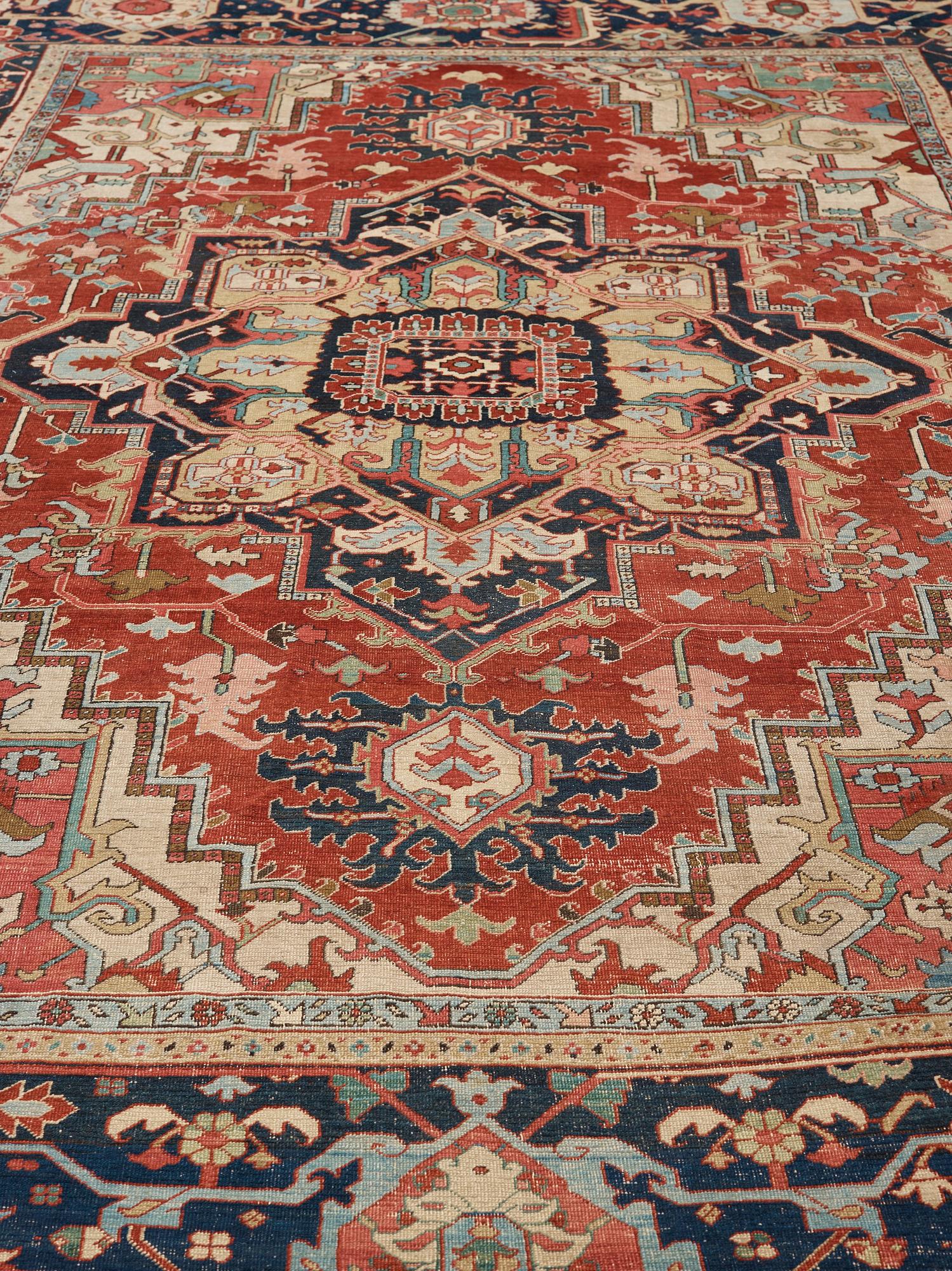 A CARPET, an antique Heriz, 476,5 x 344,5 cm.