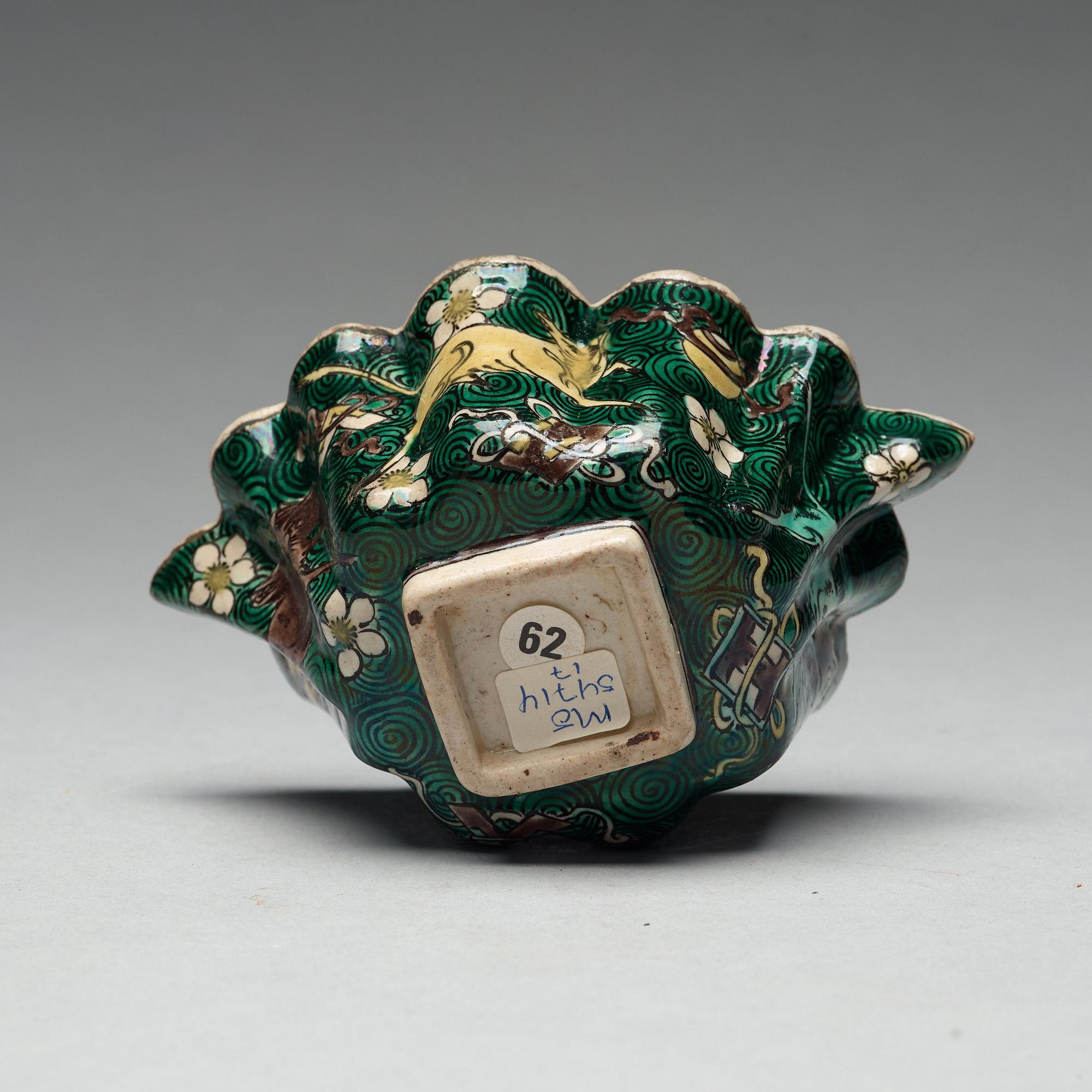 A famille verte bisquit cup, Qing dynasty, 17th century.
