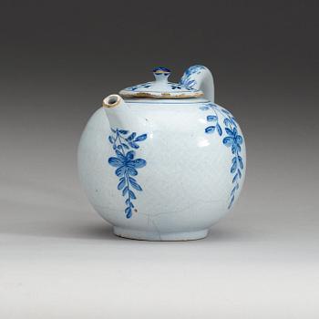 A Swedish Rörstrand faience teapot with cover, 18th Century.