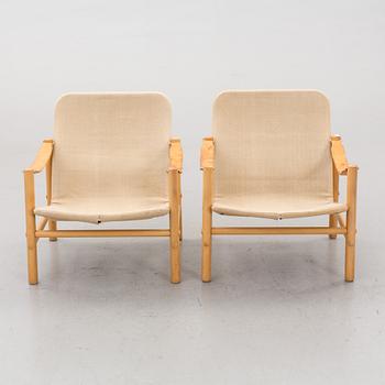 A pair of Bror Boije "Junker" Dux lounge chairs.