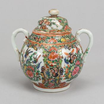 A set of 3 famille rose Canton tea pots and a suger bowl, Qing dynasty, late 19th Century.