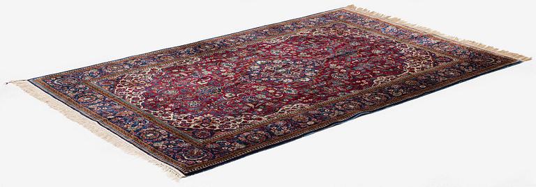 An antique silk Keshan, central Iran, c. 213 x 137 cm.