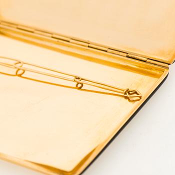 Cartier Art Deco cigarettetui 18K guld med svart emalj och safirer.