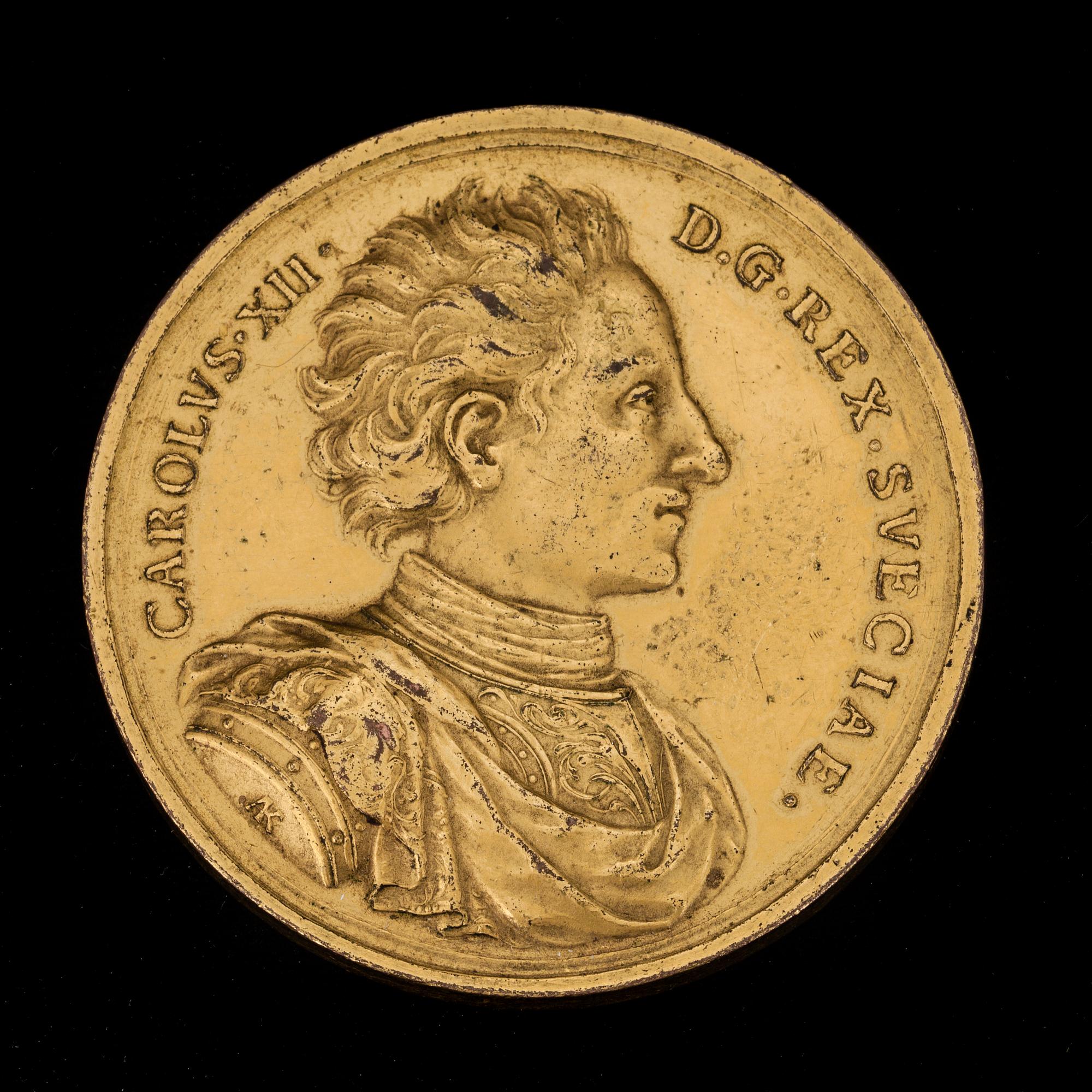 A gilded medal in memory of the battle at Fraustadt 1706 with the portrait of the Swedish King, Karl XII.