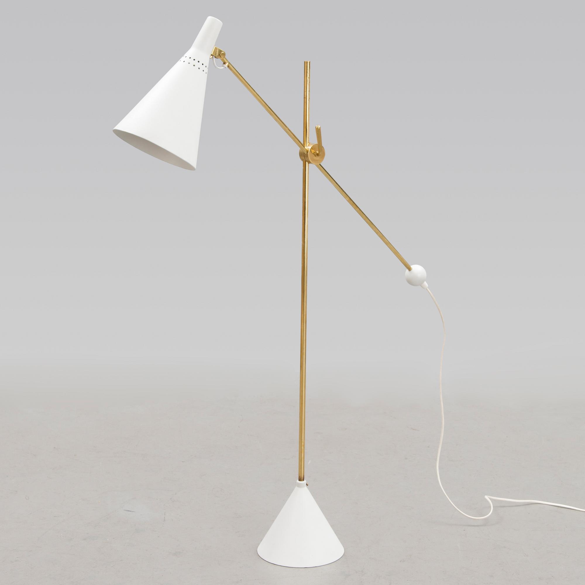 AN ADJUSTABLE FLOOR LAMP, K10-11. Manufactured by Idman Oy. Designed 1958.