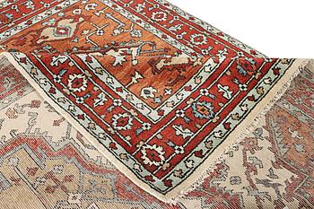 An oriental carpet, c. 296 x 238 cm.