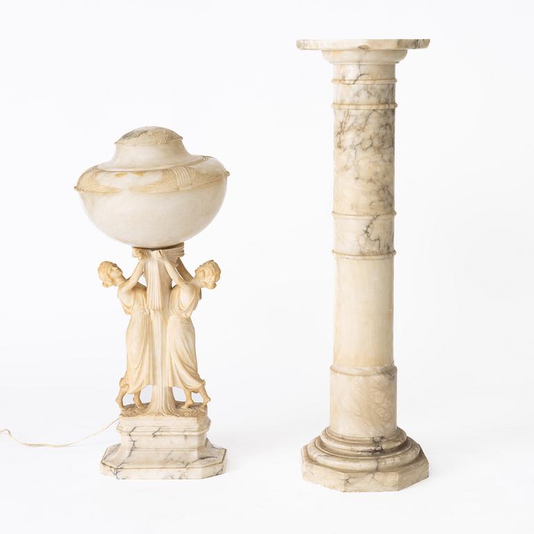 A table lamp on a pedestal, early 20th Century.