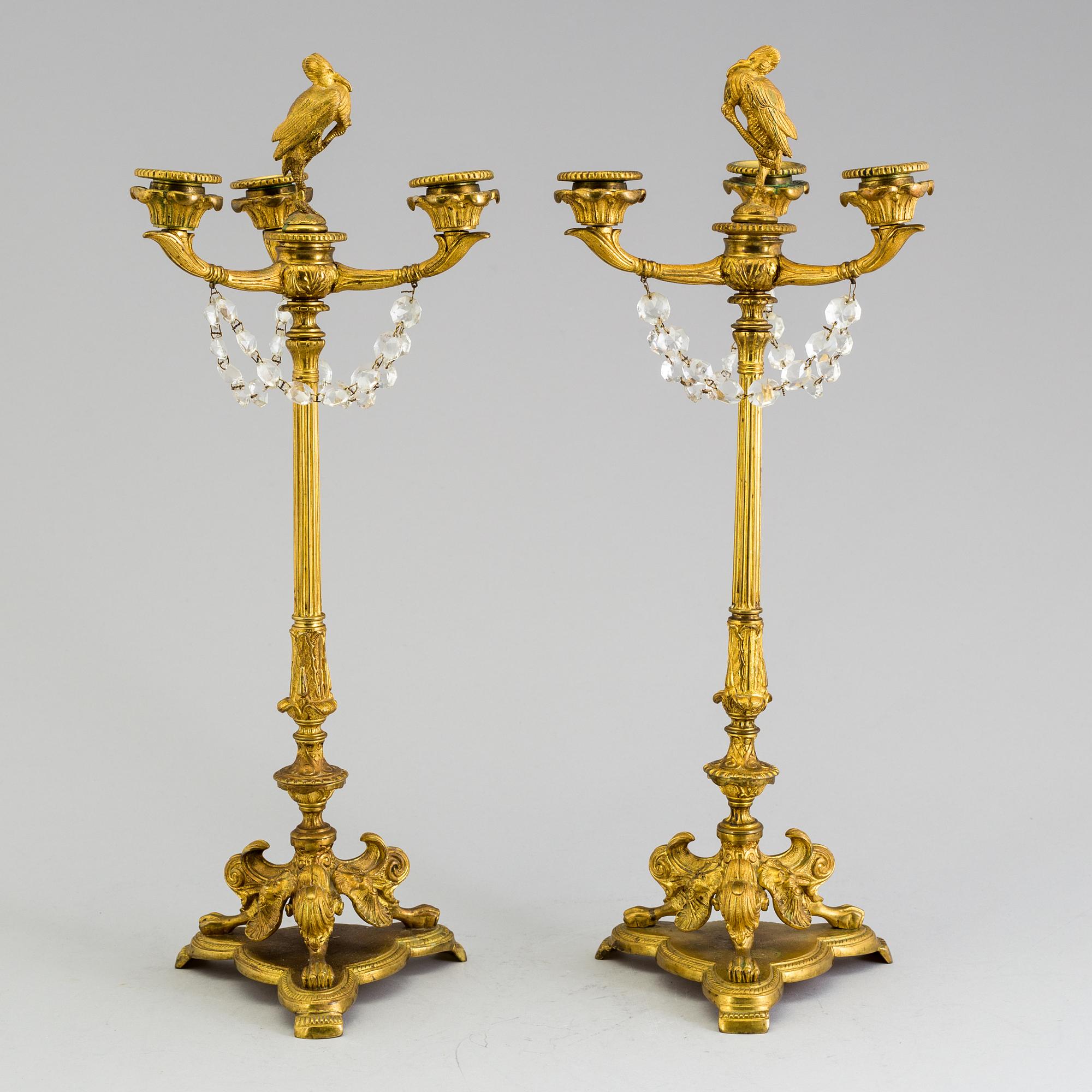 A pair of neorenaissance candelabras, about 1900.