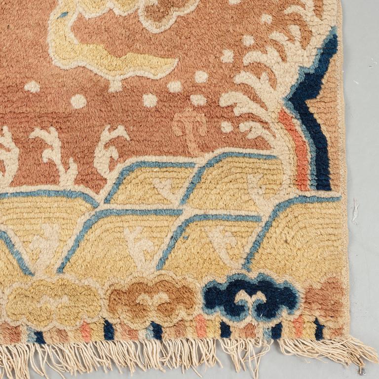 A PILLAR CARPET, an antique Ningxia figural, China late Qing, ca 304 x 130-170 cm.