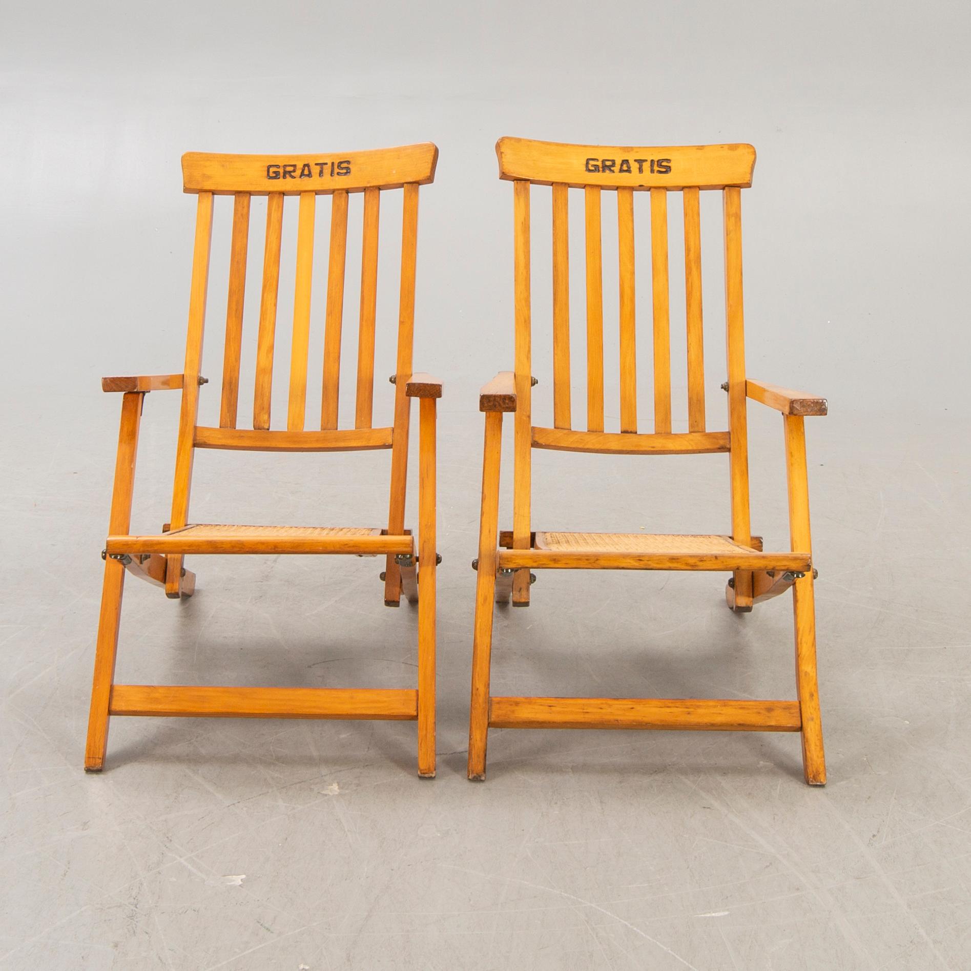 A pair of early 1900s deck chairs.