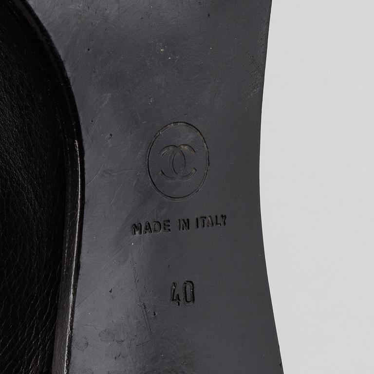 CHANEL, a pair of leather boots, size 40.