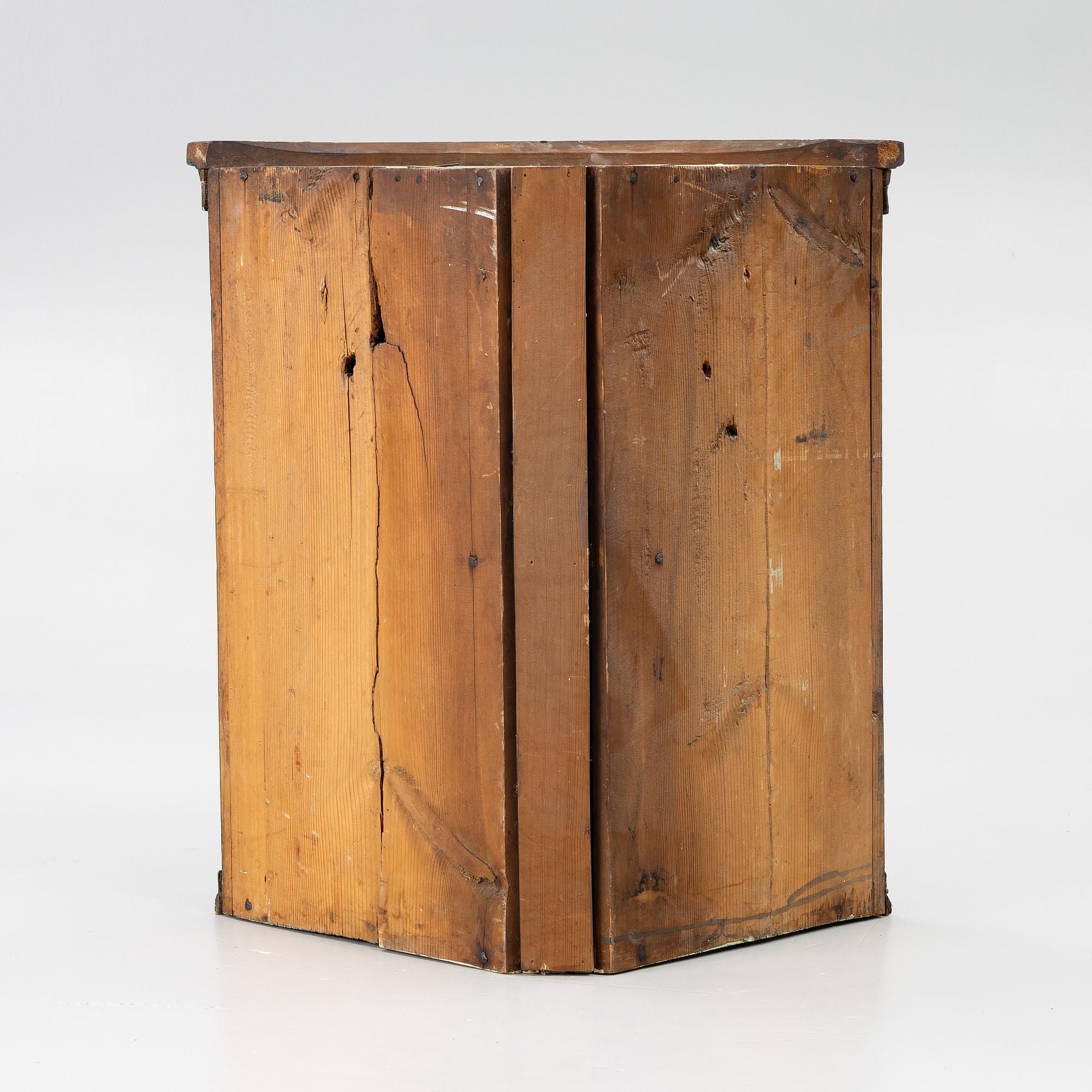 A folk art corner cabinet from Delsbo, Hälsingland dated 1847.